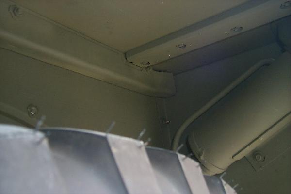 Rear left wheel well